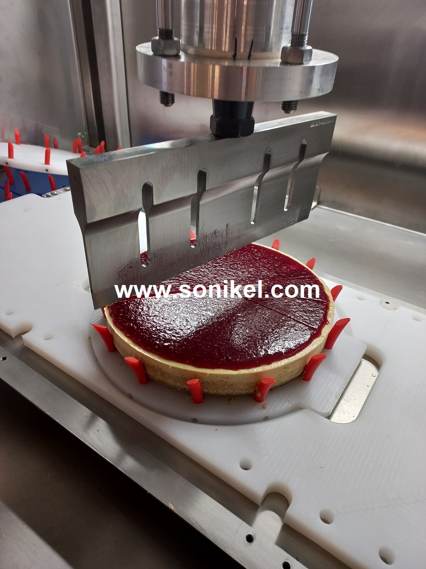 Ultrasonic Slicing of Cheesecake with Raspberry